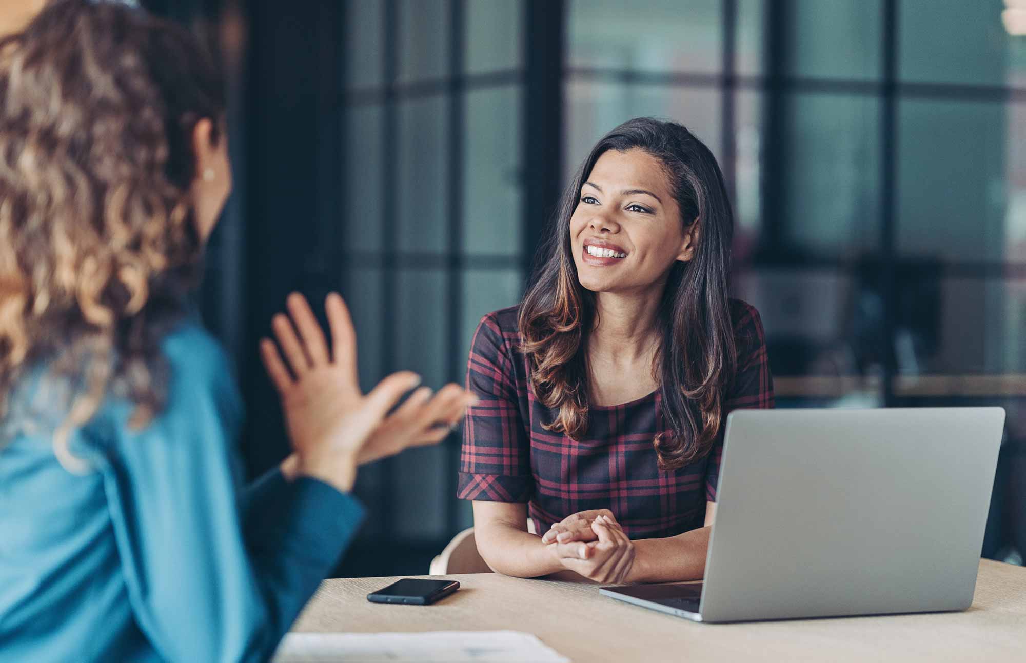 confident advisor talking to client